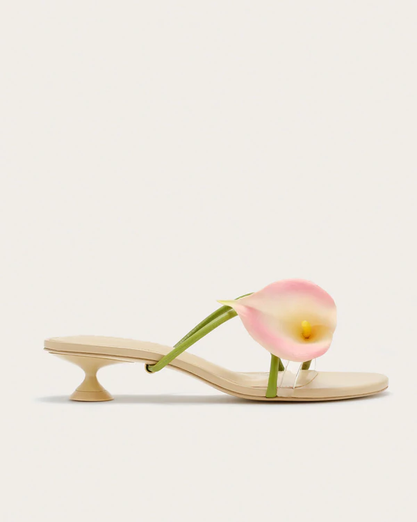 <a href="https://cultgaia.com/products/claire-mule-pink-multi?variant=43528879472714">CULT GAIA Claire Mules</a>, $498