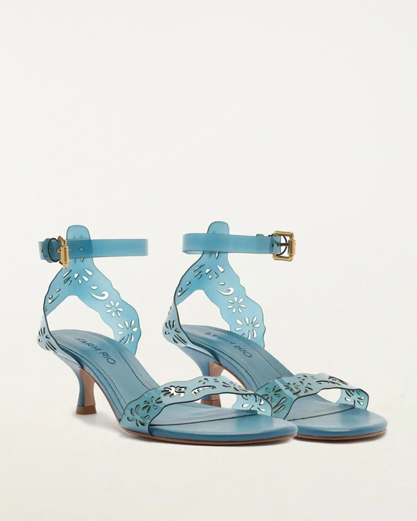 <a href="https://farmrio.com/products/lace-jelly-kitten-heel-1">FARM RIO Blue Lace Jelly Kitten Heeled Sandal</a>, $258