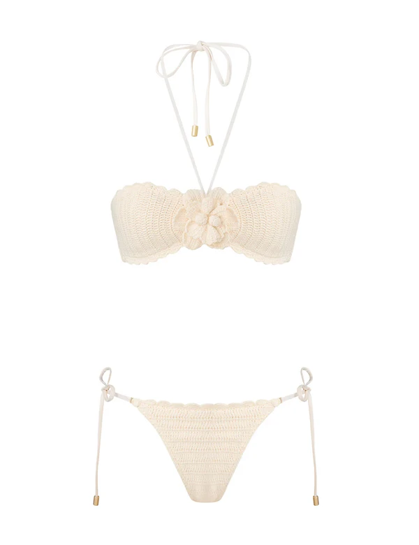 <a href="https://www.zimmermann.com/swim/swimwear/awaken-crochet-flower-bikini-cream.html">ZIMMERMANN Awaken Crochet Flower Bikini</a>, $325