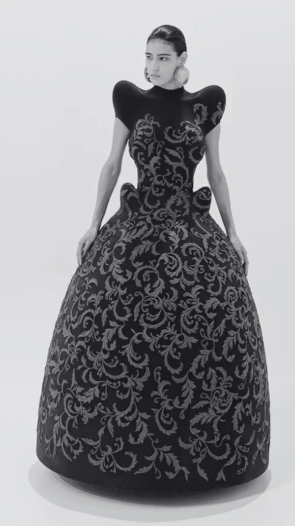 <a href="https://fashion.jeanpaulgaultier.com/en-ae/lookbooks/haute-couture-autumn-winter-2026?lookbookId=haute-couture-aw26-look-11">Jean Paul Gaultier</a>