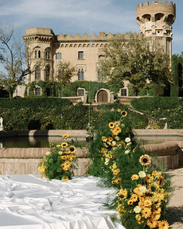 A Vibrant & Artistic Barcelona Wedding Amongst an Iconic Gaudi Masterpiece & Castle Garden