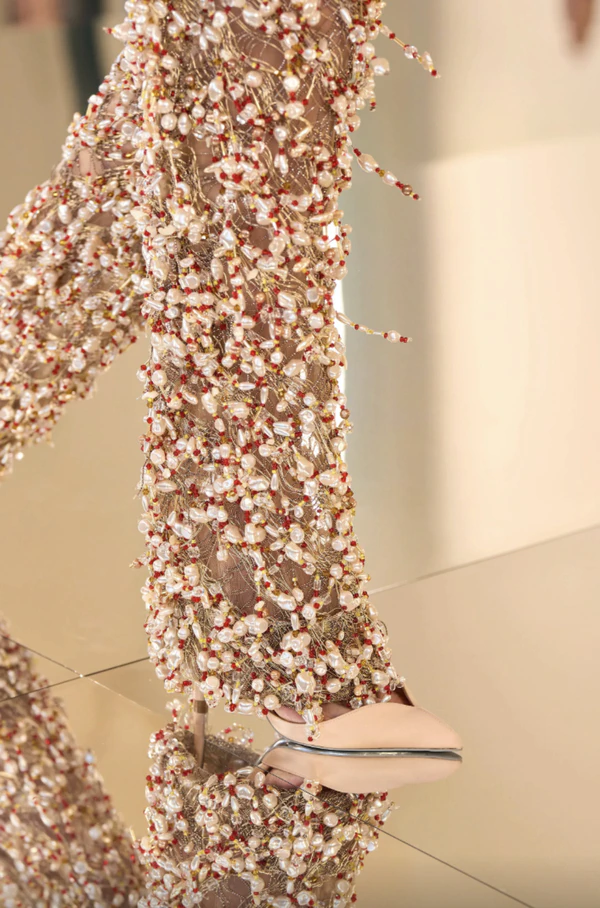 <a href="https://schiaparelli.com/en/pages/haute-couture-automne-hiver-2026-27">Schiaparelli</a>