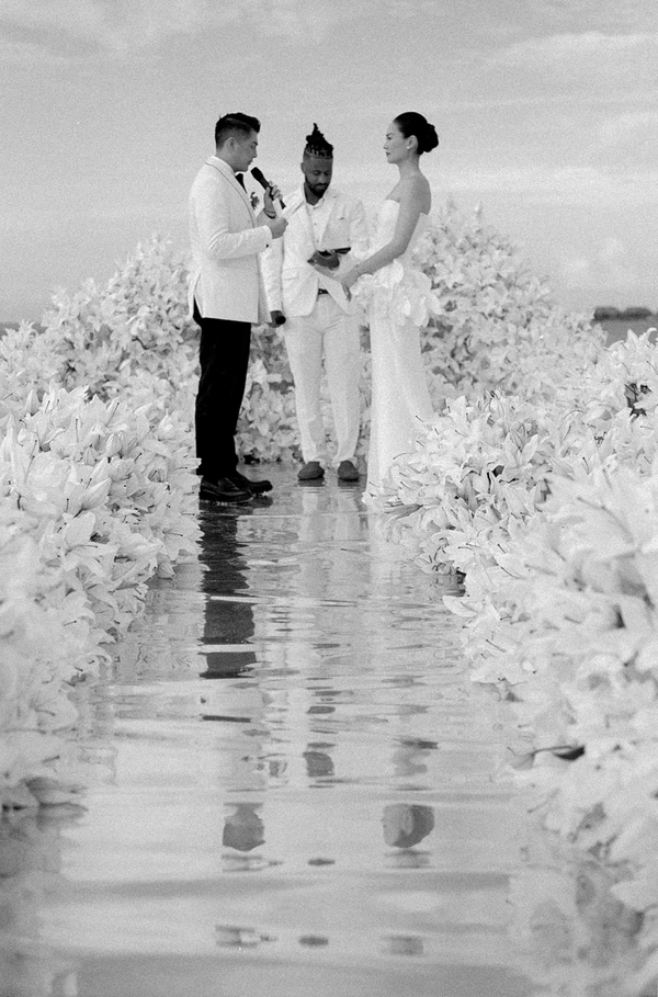 10,000 Lilies & Turquoise Waters Framed This Dreamy Beach Wedding in the Maldives