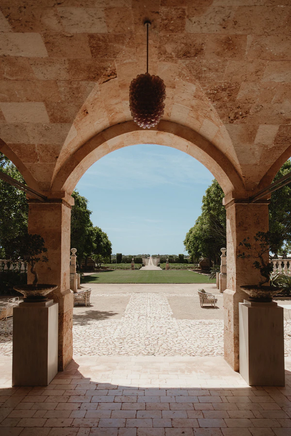 Giant Sculptural Florals & Dreamy Drapery by Mia Sylvia at This Stone Quarry Wedding in Menorca