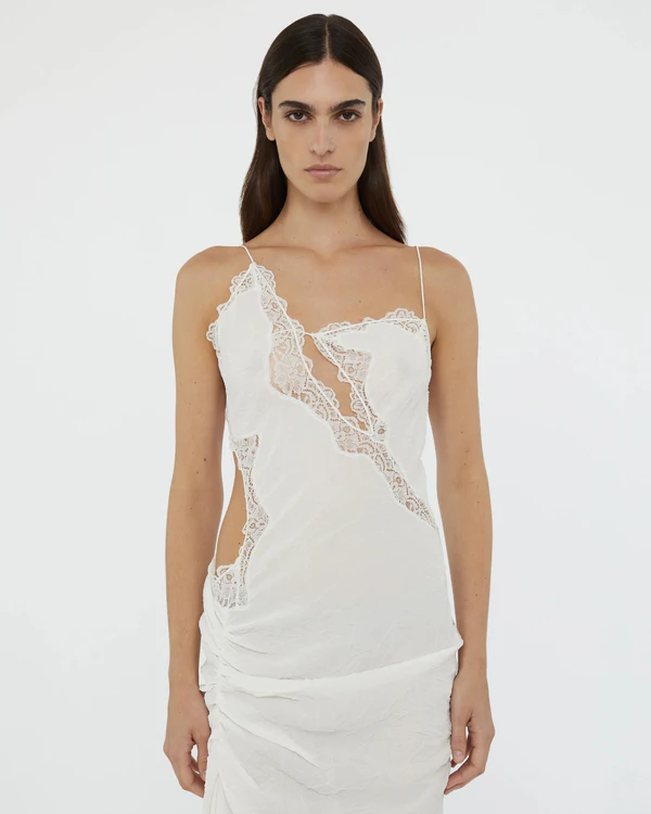 <a href="https://christopheresber.com.au/collections/ready-to-wear/products/crimped-lace-cami-dress-white?_pos=33&amp;_fid=bb41eb4a6&amp;_ss=c&amp;variant=45304940429465">CHRISTOPHER ESBER Dress</a>, $1300