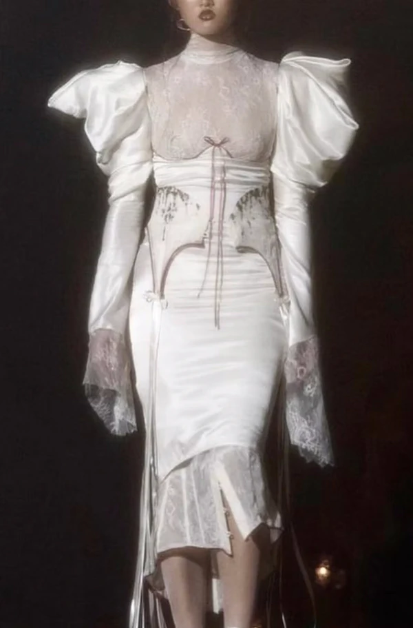 <a href="https://www.dreamingeli.com/product-page/thirst-for-love-dress">DREAMING ELI Dress</a>, $2085