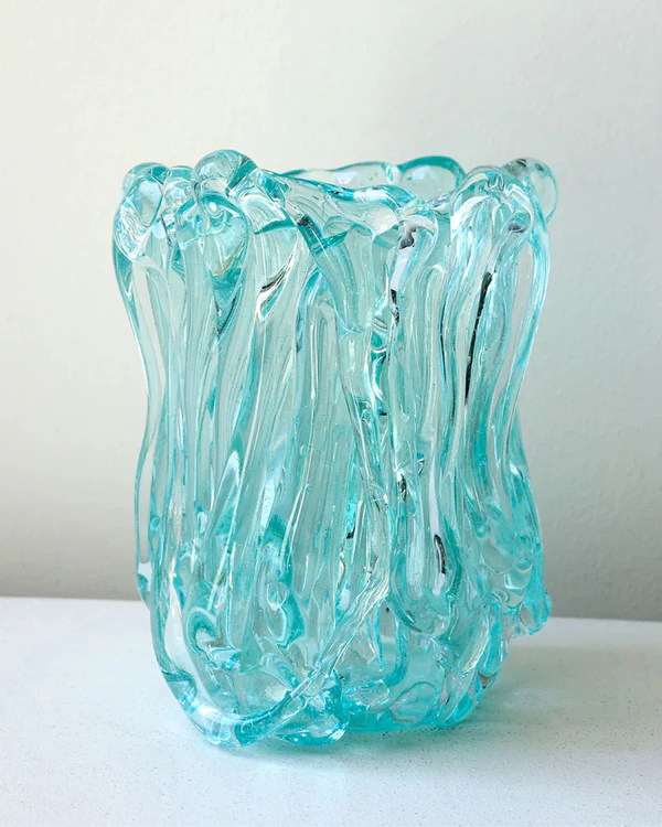 <a href="https://us.completedworks.com/collections/homeware-glass-1/products/b157-recycled-glass-medium-vase-in-clear?variant=55070520803706">COMPLETEDWORKS Recycled Glass Medium Vase</a>, $994