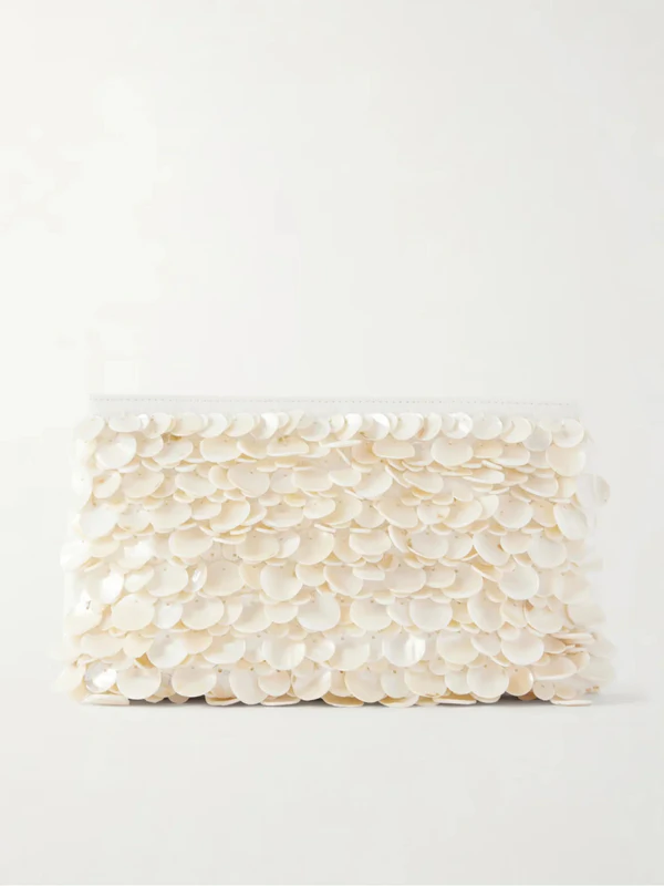 <a href="https://www.senser.net/products/senserads-6890f97a-9049-2fba-7663-483058f889c9/Google/1716/simkhai-reese-shell-beaded-clutch-627688473063680">SIMKHAI Clutch</a> from Senserl, $1,117