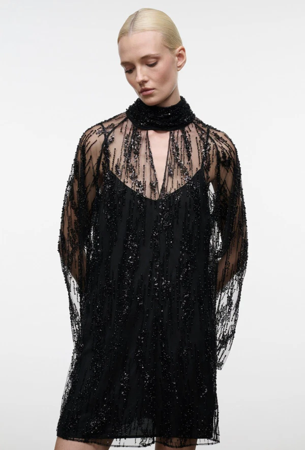 <a href="https://staud.clothing/products/esther-mini-dress-black">STAUD Beaded Mini Dress, $650</a>
