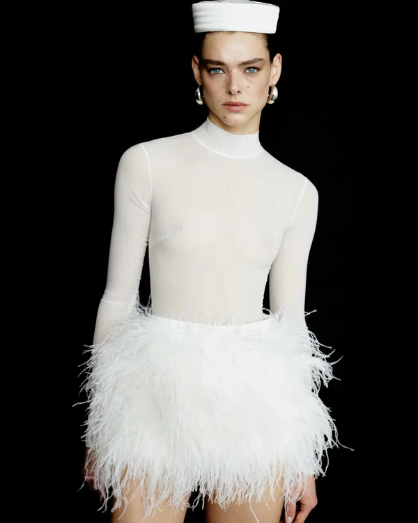 <a href="https://ilkyazozel.com/products/camille-skirt-in-white-mustang">Ilkyaz Ozel</a>