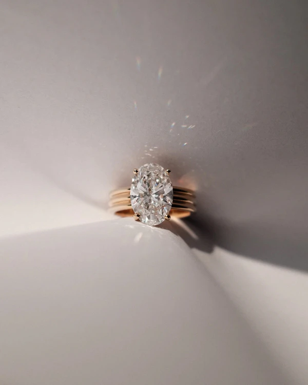 <a href="https://tinxxjewelry.com/collections/engagement/products/asscher-cut-diamond-triple-band-solitaire-ring">Tinxx</a>