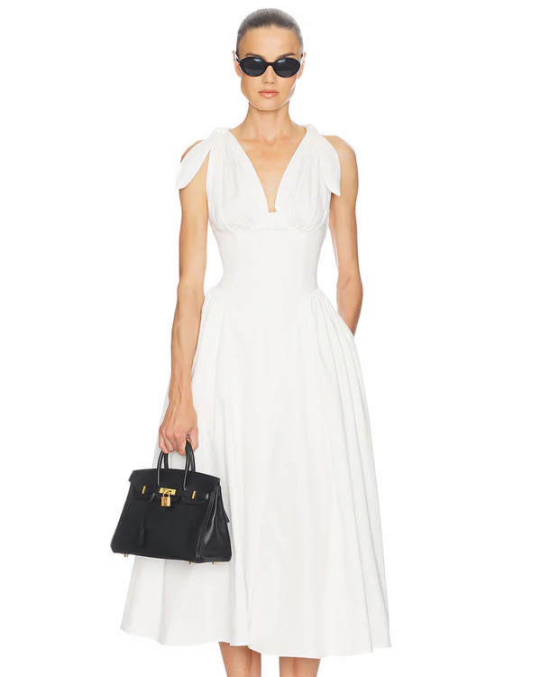 <a href="https://www.revolveclothing.com.au/helsa-fairweather-midi-dress-in-stretch-cotton-sateen-in-ivory/dp/HLSA-WD257/?d=Womens&amp;amp;page=1&amp;amp;lc=23&amp;amp;navsrc=main&amp;amp;itrownum=30&amp;amp;itcurrpage=1&amp;amp;itview=05">HELSA Dress</a> from Revolve, $349
