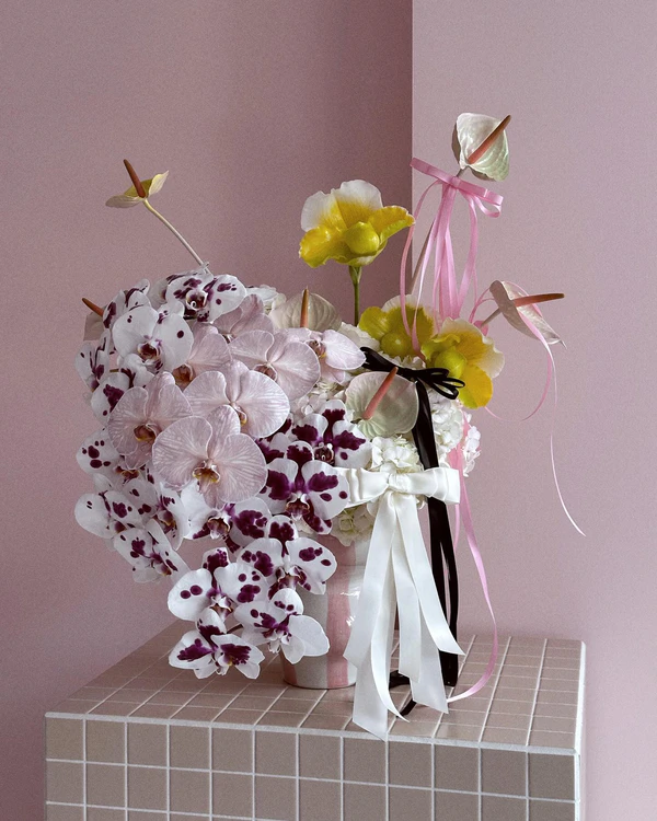<span style="color: #95a5a6;"><em><span style="text-decoration: underline;"><a style="color: #95a5a6; text-decoration: underline;" href="https://www.instagram.com/flowersbybrettmatthewjohn/" target="_blank" rel="noopener">Flowers by Brett Matthew John</a></span></em></span>