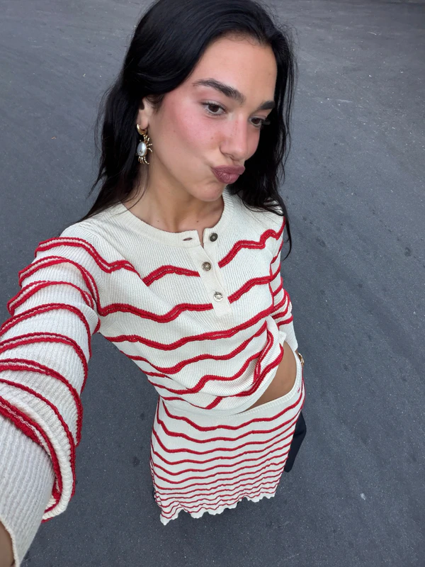 Content: <a href="https://www.instagram.com/p/DaLCgiUDmob/?img_index=7">Dua Lipa</a>