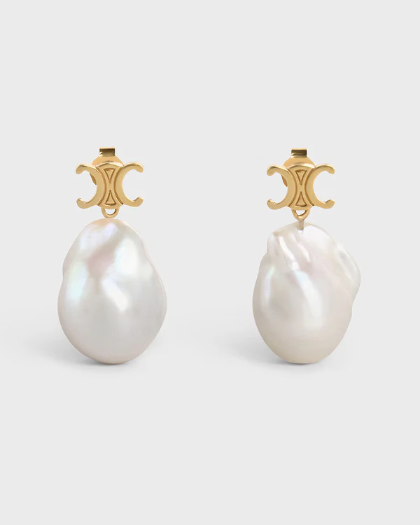 <a href="https://www.celine.com/en-us/women/jewelry/earrings/les-perles-celine-baroque-earrings-in-brass-with-gold-finish-and-cultured-pearls-46W356BPA.01GI.html">CELINE Earrings</a>, $820
