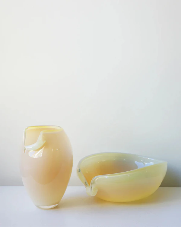 <a href="https://us.completedworks.com/products/b143-recycled-glass-medium-vase-in-yellow">COMPLETEDWORKS Recycled Glass Medium Vase,</a> $1,059 
