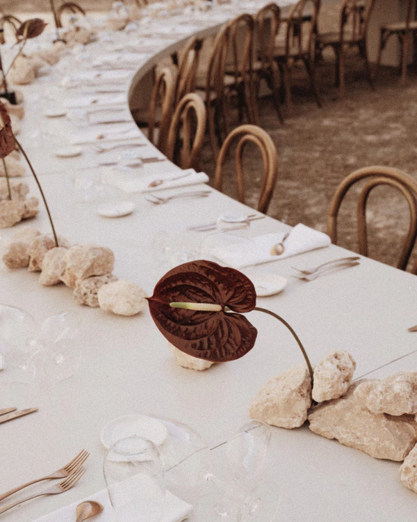 An Intimate Menorca Quarry Wedding with Avant-Garde Design & Vintage Bridal Looks