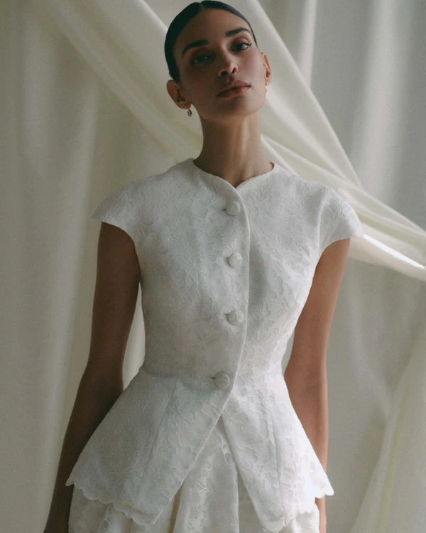 <a href="https://markarian-nyc.com/collections/bridal/products/anne-top">MARKARIAN Top</a>, $2850, <a href="https://markarian-nyc.com/products/esme-skirt-1?pr_prod_strat=e5_desc&amp;pr_rec_id=fde53e71f&amp;pr_rec_pid=9671866155253&amp;pr_ref_pid=9587839107317&amp;pr_seq=uniform">MARKARIAN Dress</a>, $2450