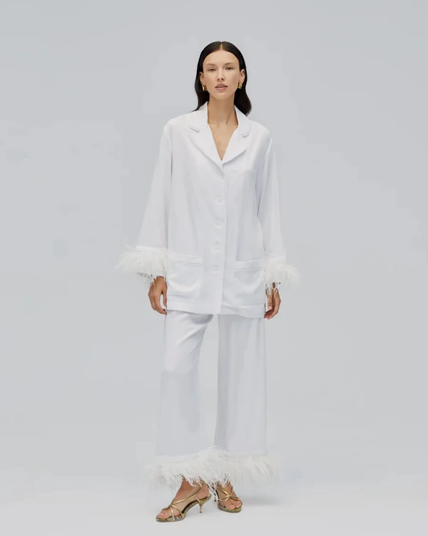 <a href="https://the-sleeper.com/products/party-pajamas-set-with-feathers-in-white">SLEEPER Set</a>, $429